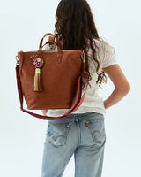 Consuela - Slings - Brandy Sling