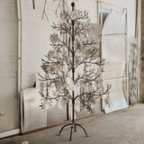 Jan Barboglio Mesquite iron tree dressed with silver ornaments