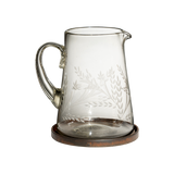 Jan Barboglio Hacienda pitcher, clear etched glass on an iron coaster
