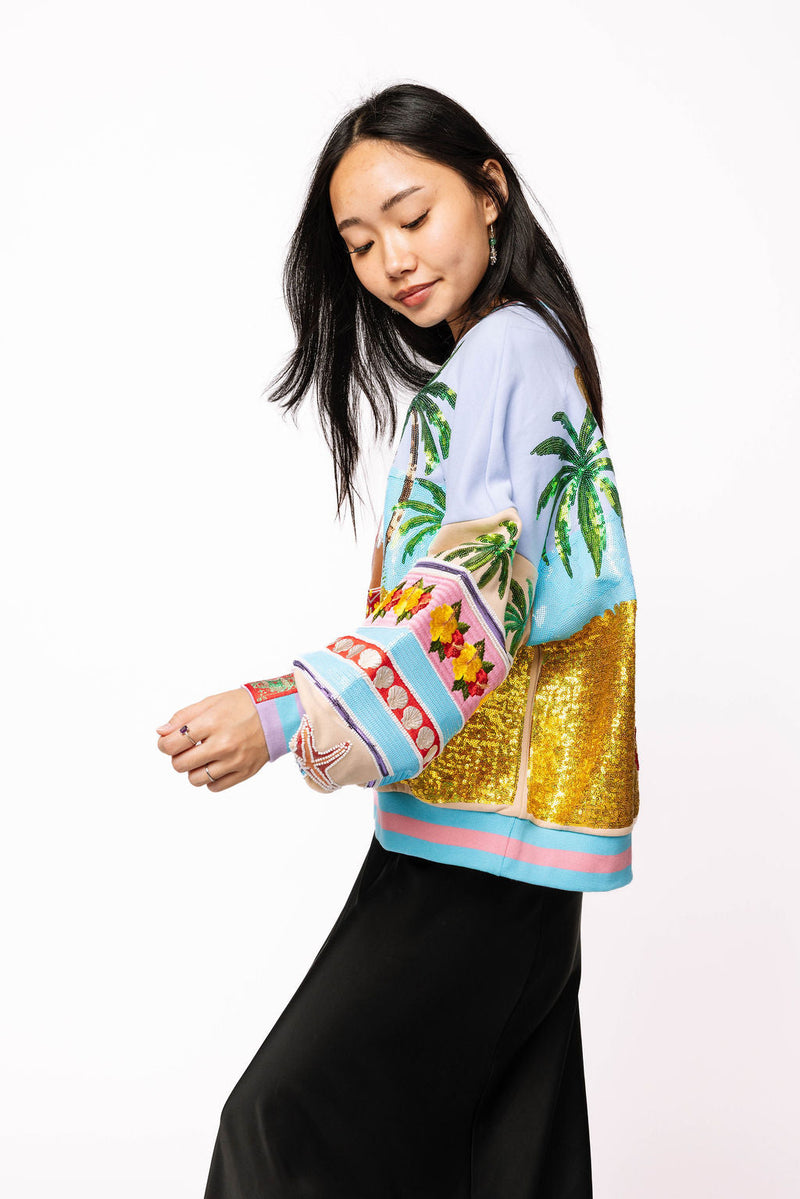Queen of Sparkles - Multi Vintage Vacation Santa Sweatshirt