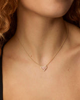Ari Heart Gold Pendant Necklace in Rose Quartz by Kendra Scott