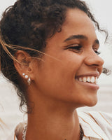 Mikki Metal Huggie Earrings in Silver by Kendra Scott