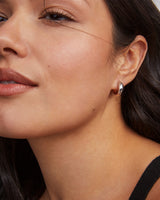 Mikki Metal Huggie Earrings in Silver by Kendra Scott